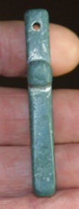 aventurine crucifix showing the hole for the leather thong
